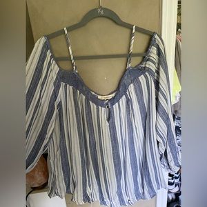 blue and white cold shoulder blouse. keyhole front
